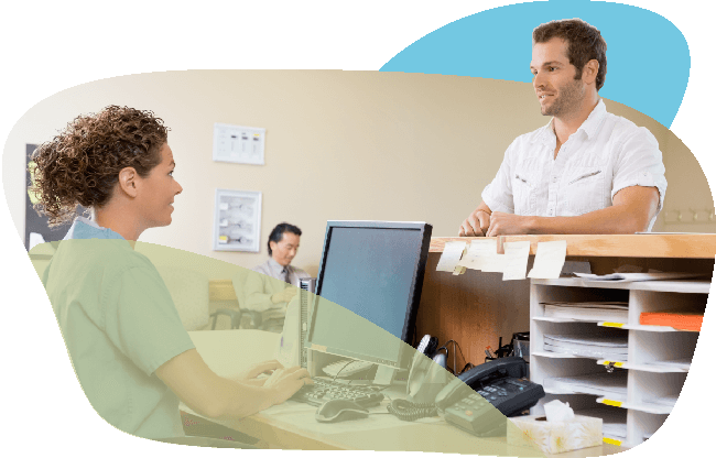 Man standing at doctor's reception for neck pain treatment
